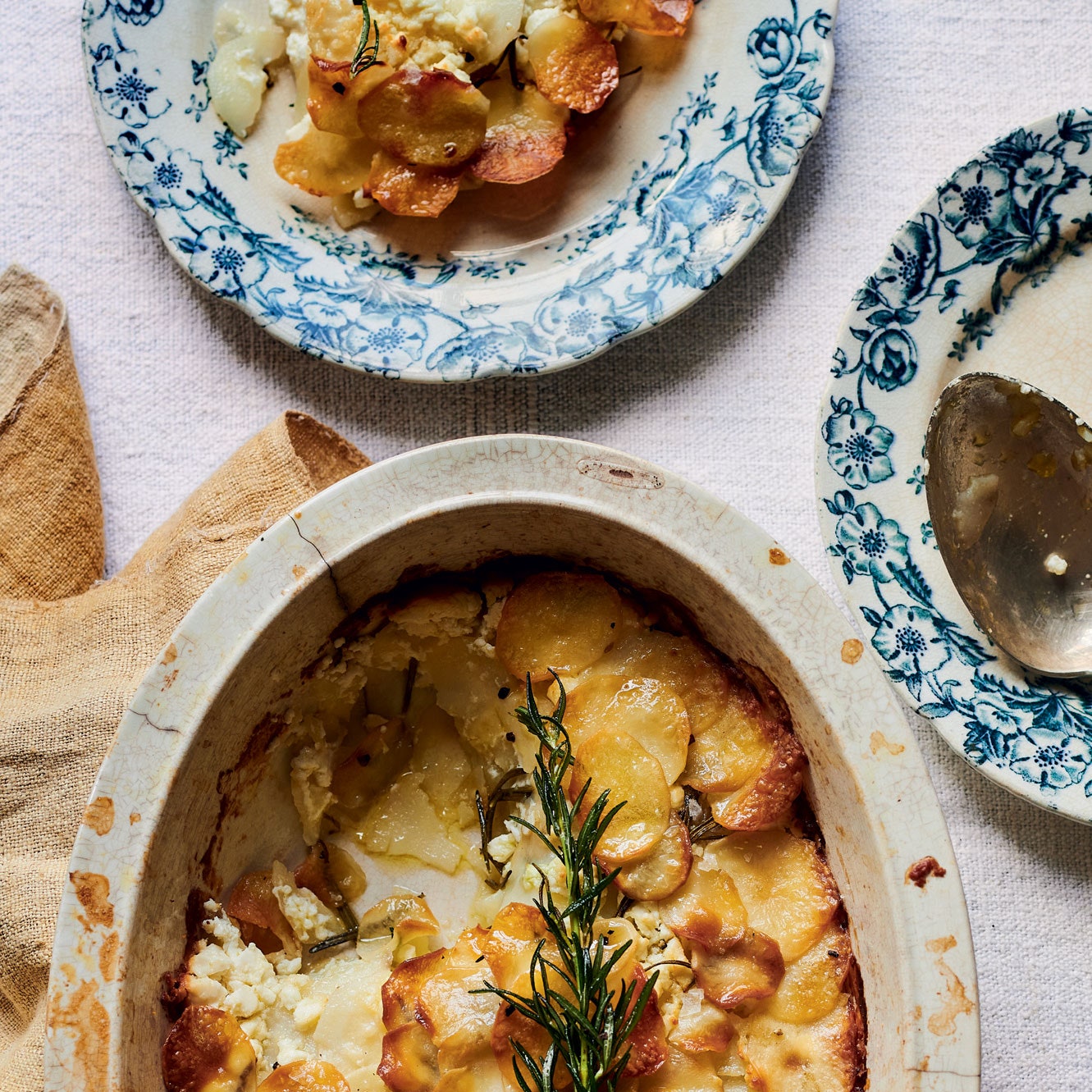 New potato, feta and rosemary gratin