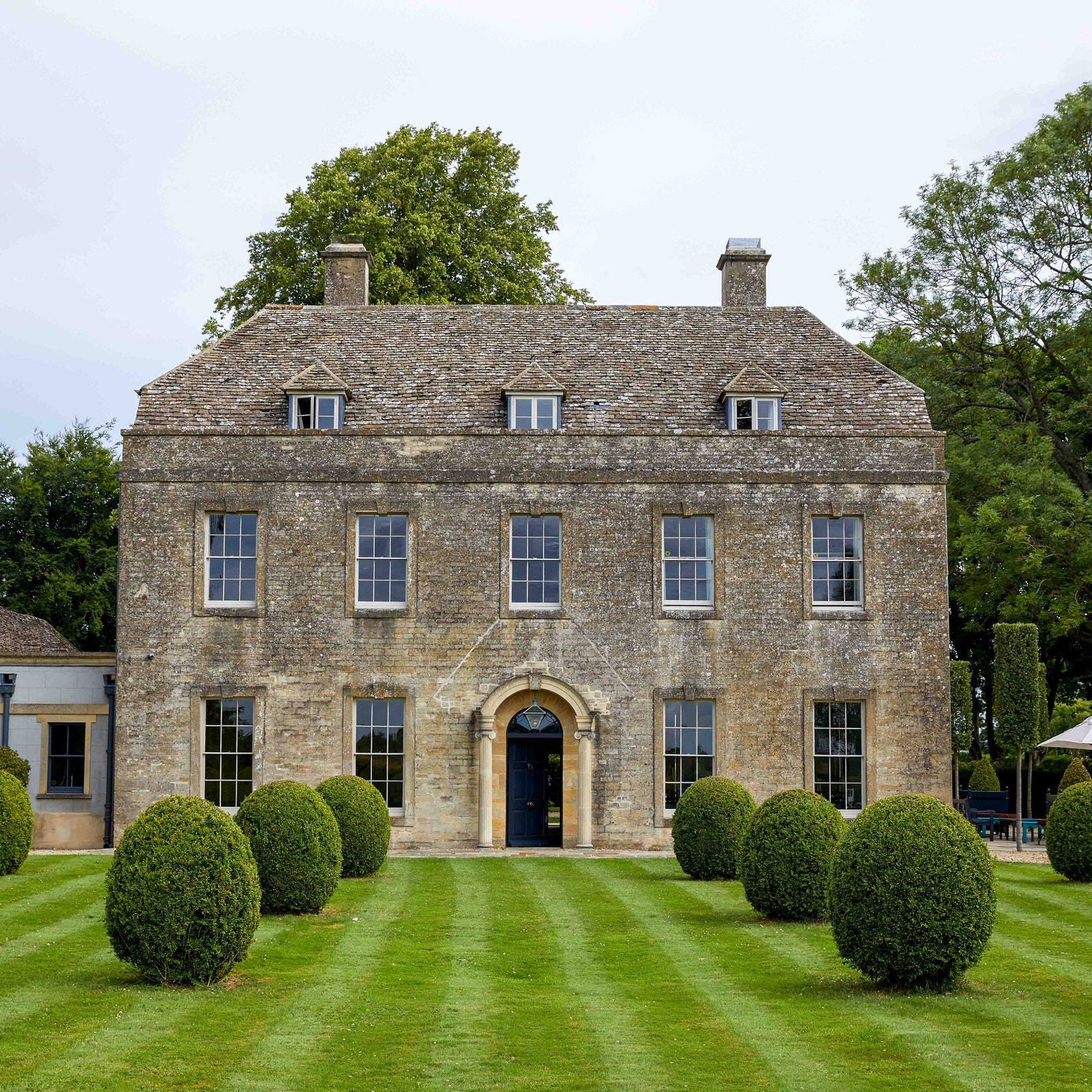 A graceful Georgian rectory set in five acres of gentle Gloucestershire landscape